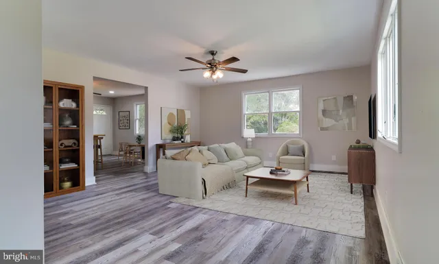 a living room with furniture and window