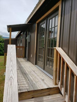1073 Edgehill Road Montvale, VA 24122 - Photo 14 of 34 rp walkway to kitchen door and dining ar