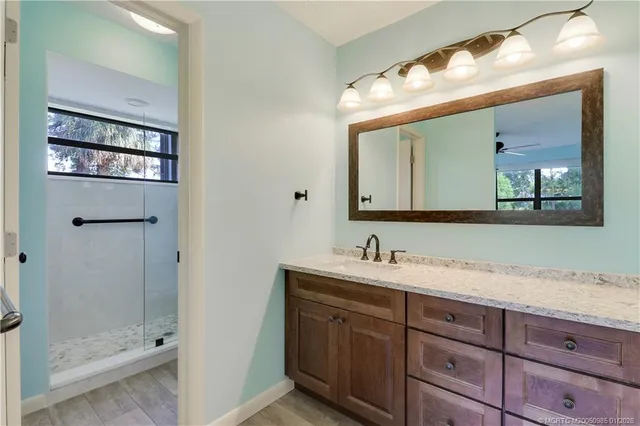 a bathroom with a shower and a toilet