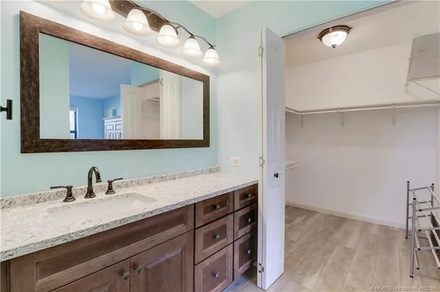 a view of an empty room with a glass door