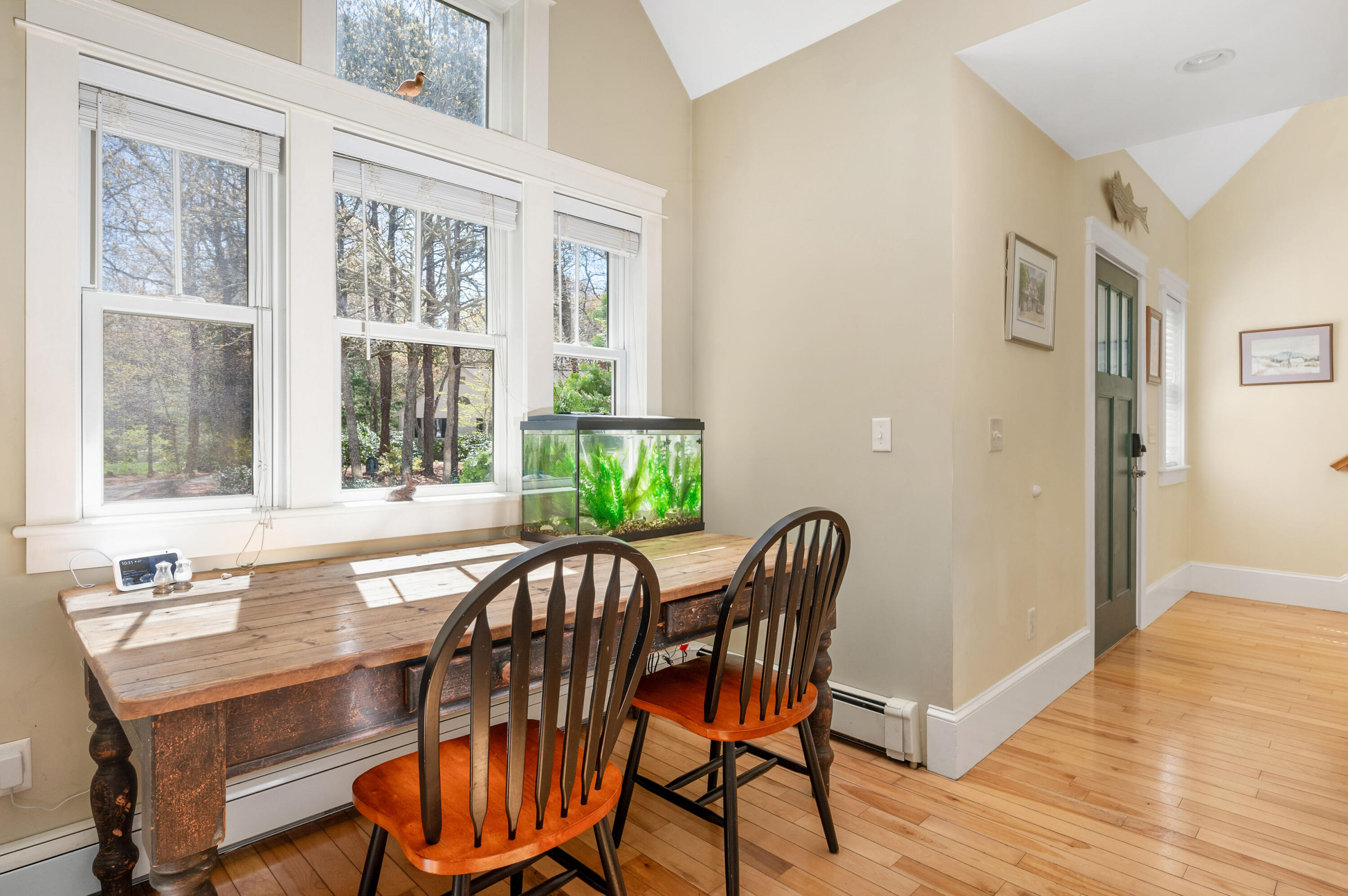 110 Clamshell Cove Road Cotuit, MA 02635 - Photo 14 of 56 a view of a a dining room with furniture window and wooden floor
