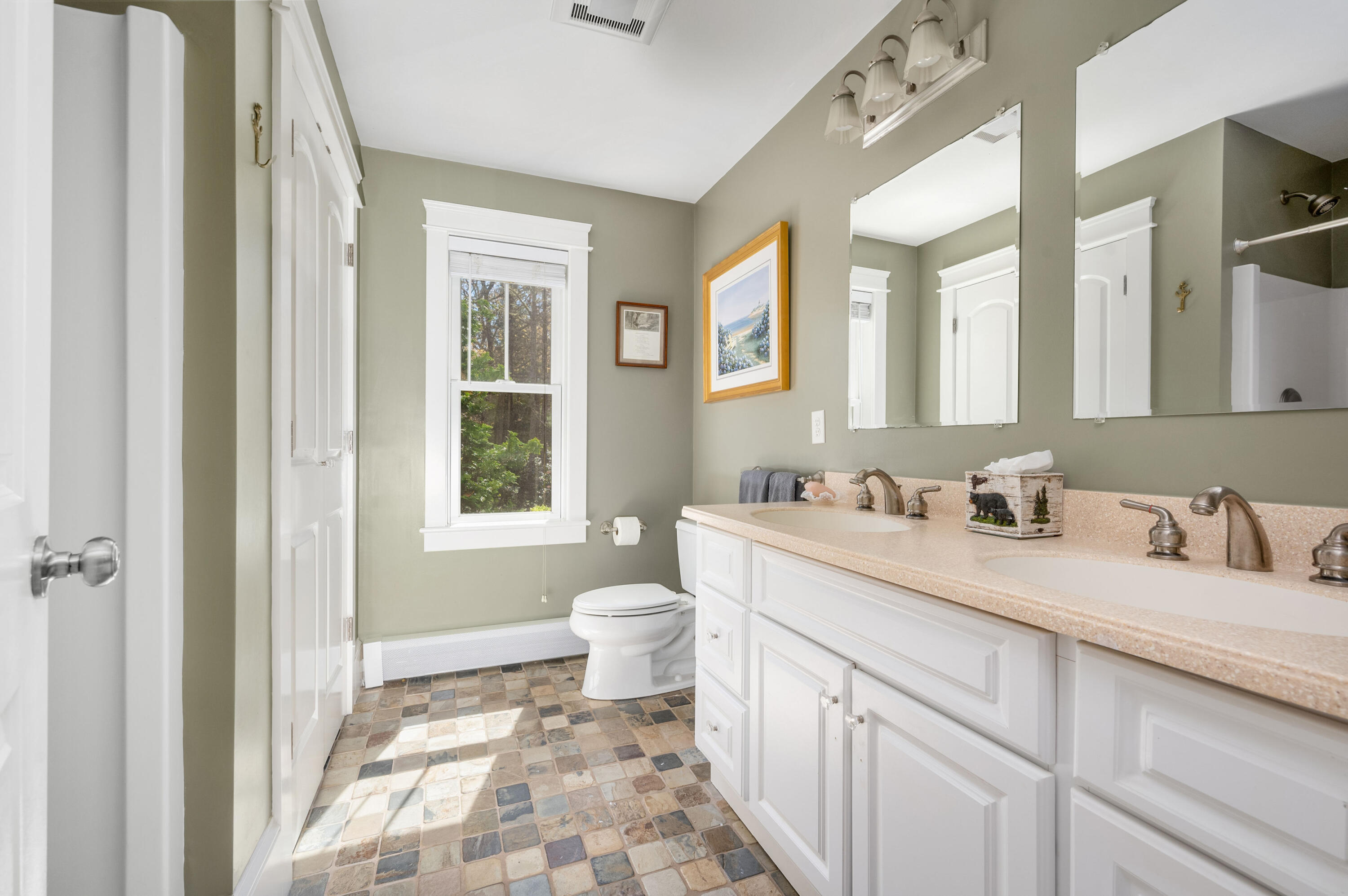 110 Clamshell Cove Road Cotuit, MA 02635 - Photo 26 of 56 a bathroom with a granite countertop sink mirror vanity and a toilet