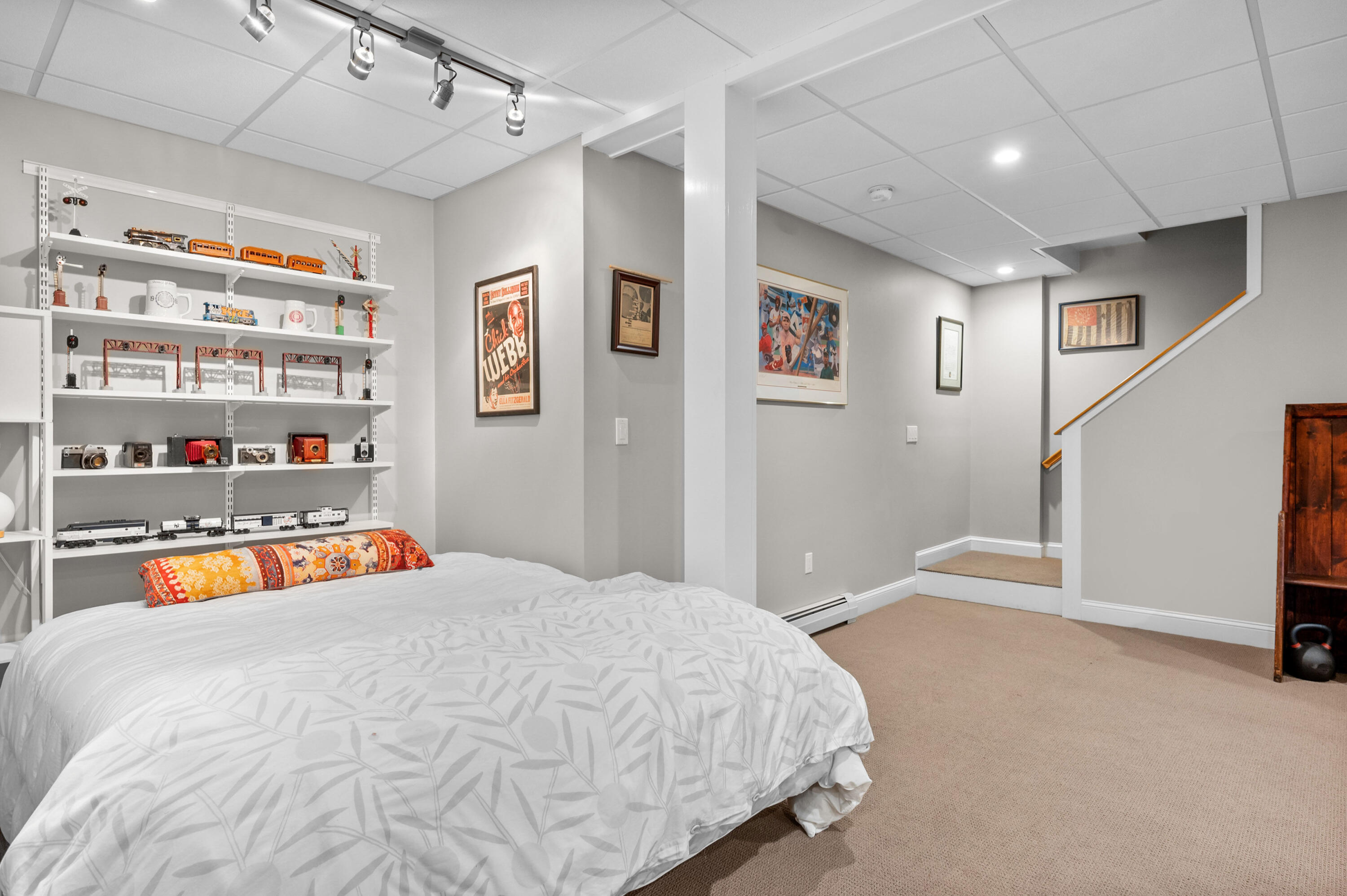 110 Clamshell Cove Road Cotuit, MA 02635 - Photo 34 of 56 a bedroom with a bed and a walk in closet