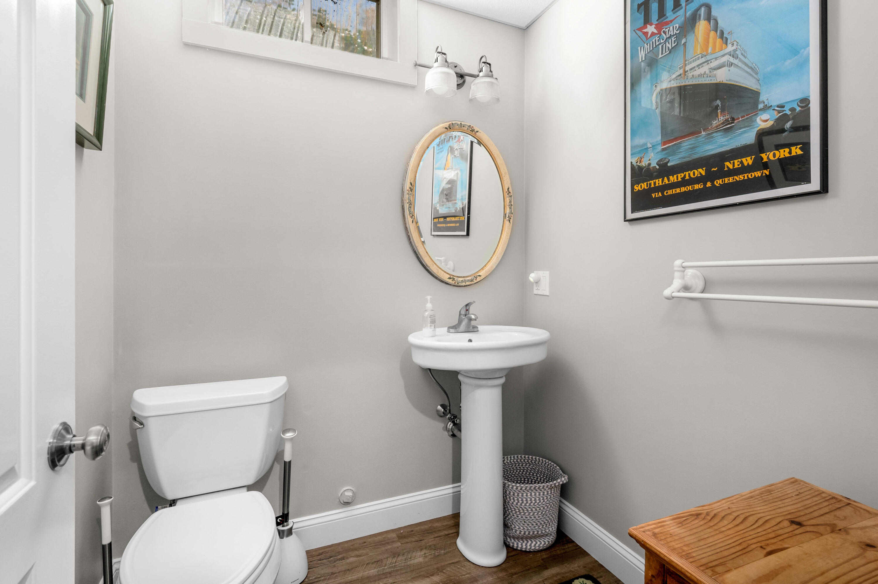 110 Clamshell Cove Road Cotuit, MA 02635 - Photo 35 of 56 a bathroom with a toilet a sink and a mirror