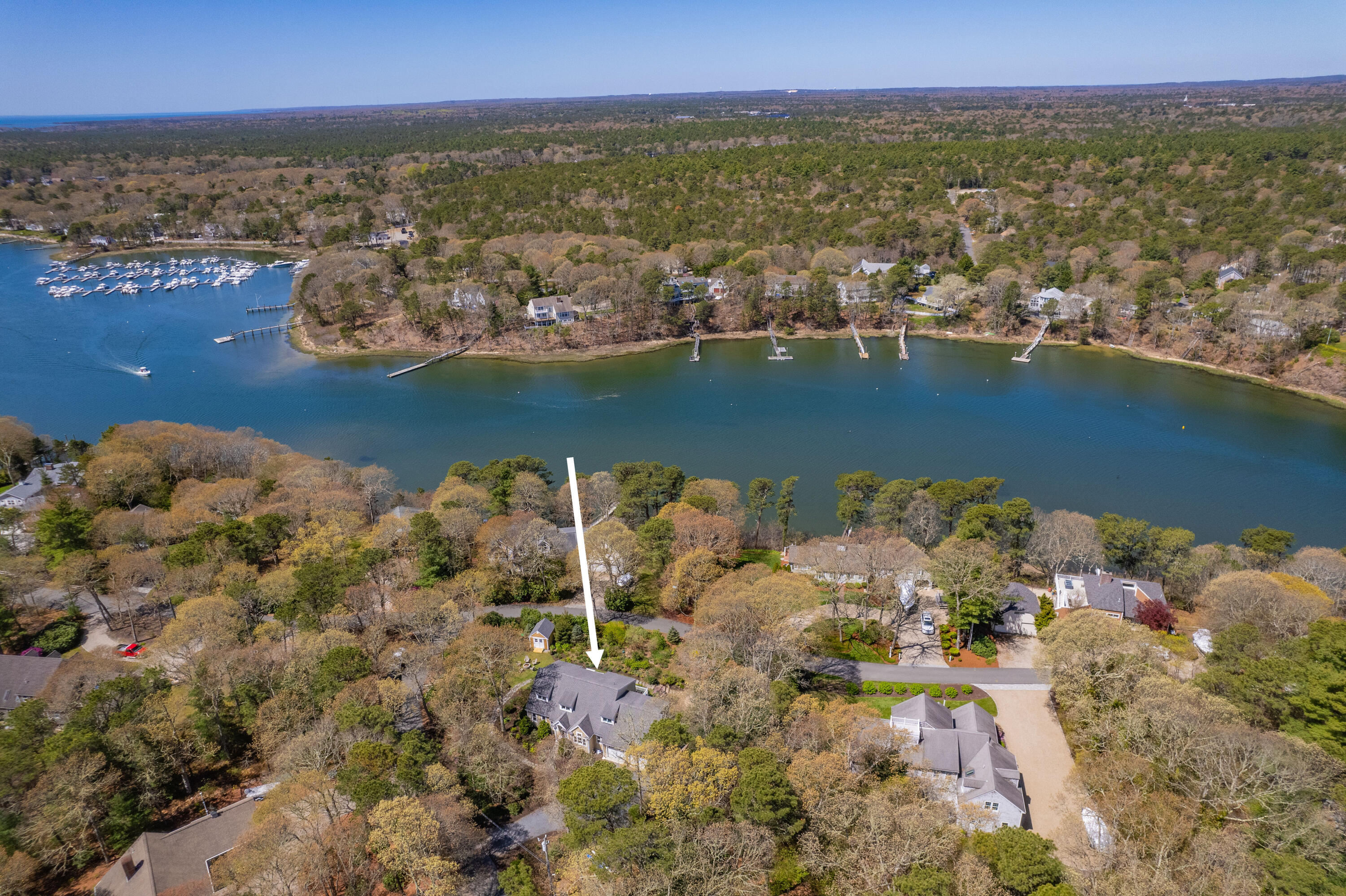 110 Clamshell Cove Road Cotuit, MA 02635 - Photo 45 of 56 an aerial view of a house with a lake view