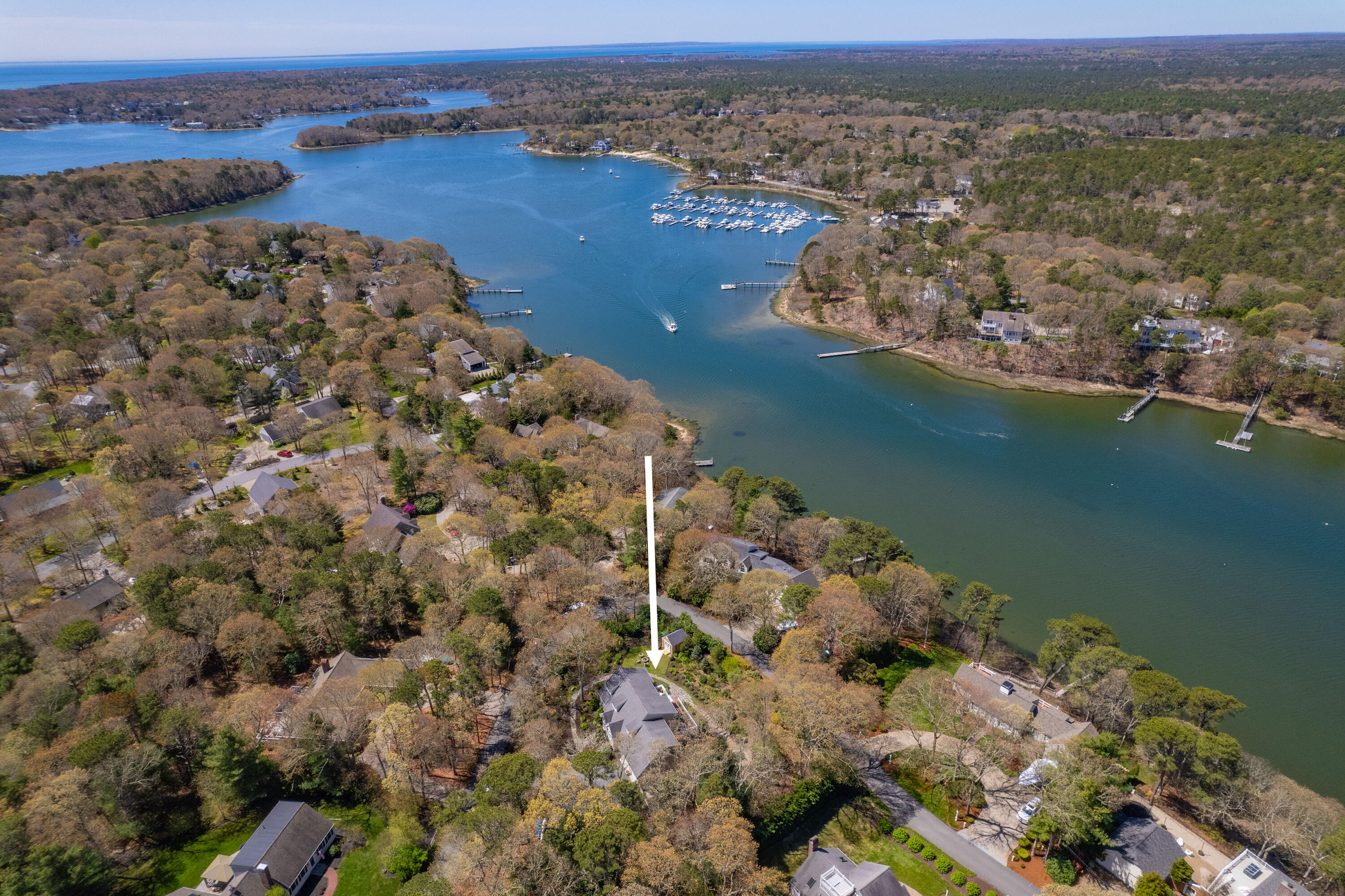 110 Clamshell Cove Road Cotuit, MA 02635 - Photo 46 of 56 an aerial view of a house with a lake view