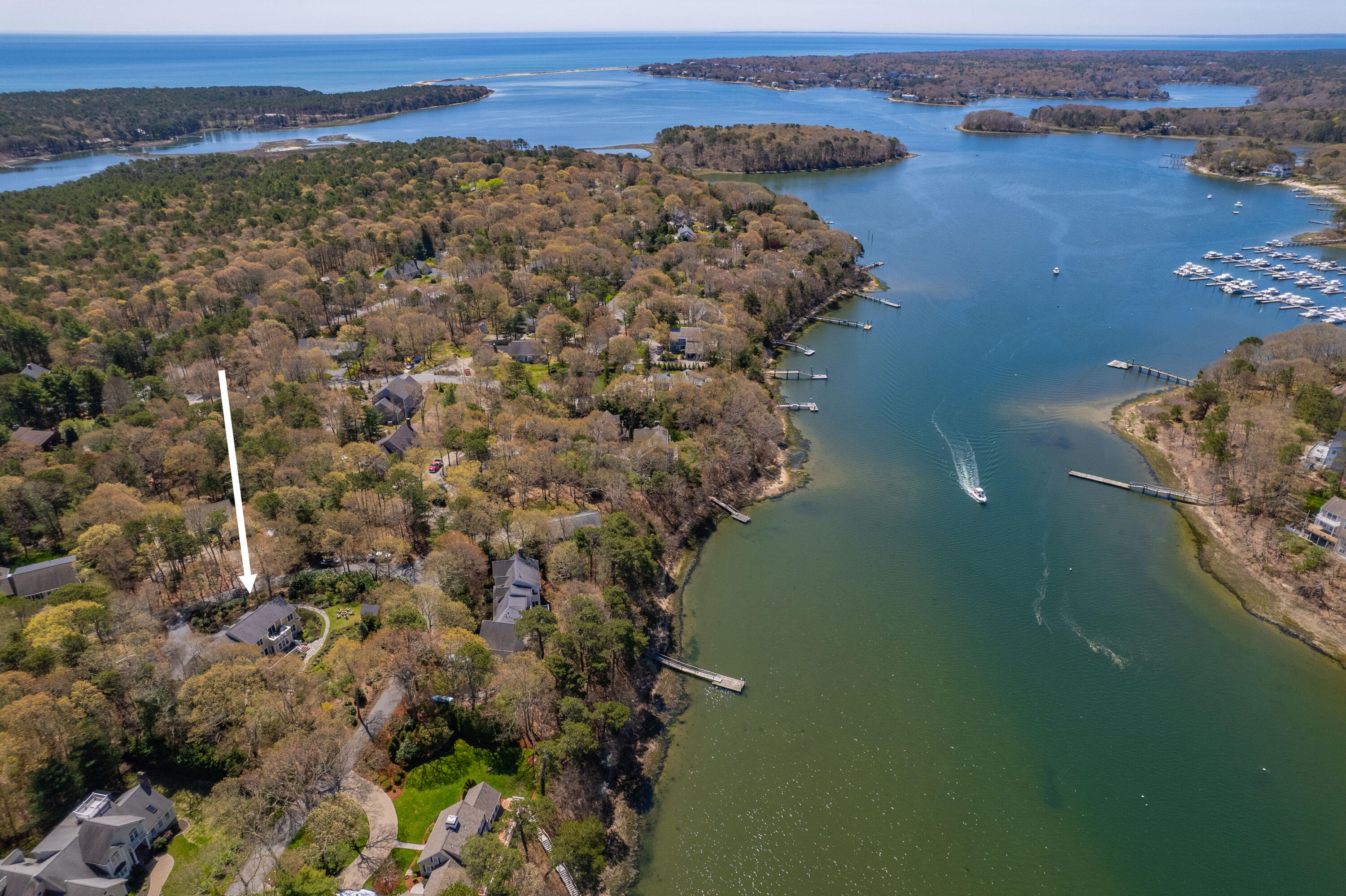 110 Clamshell Cove Road Cotuit, MA 02635 - Photo 47 of 56 a view of a lake with a mountain