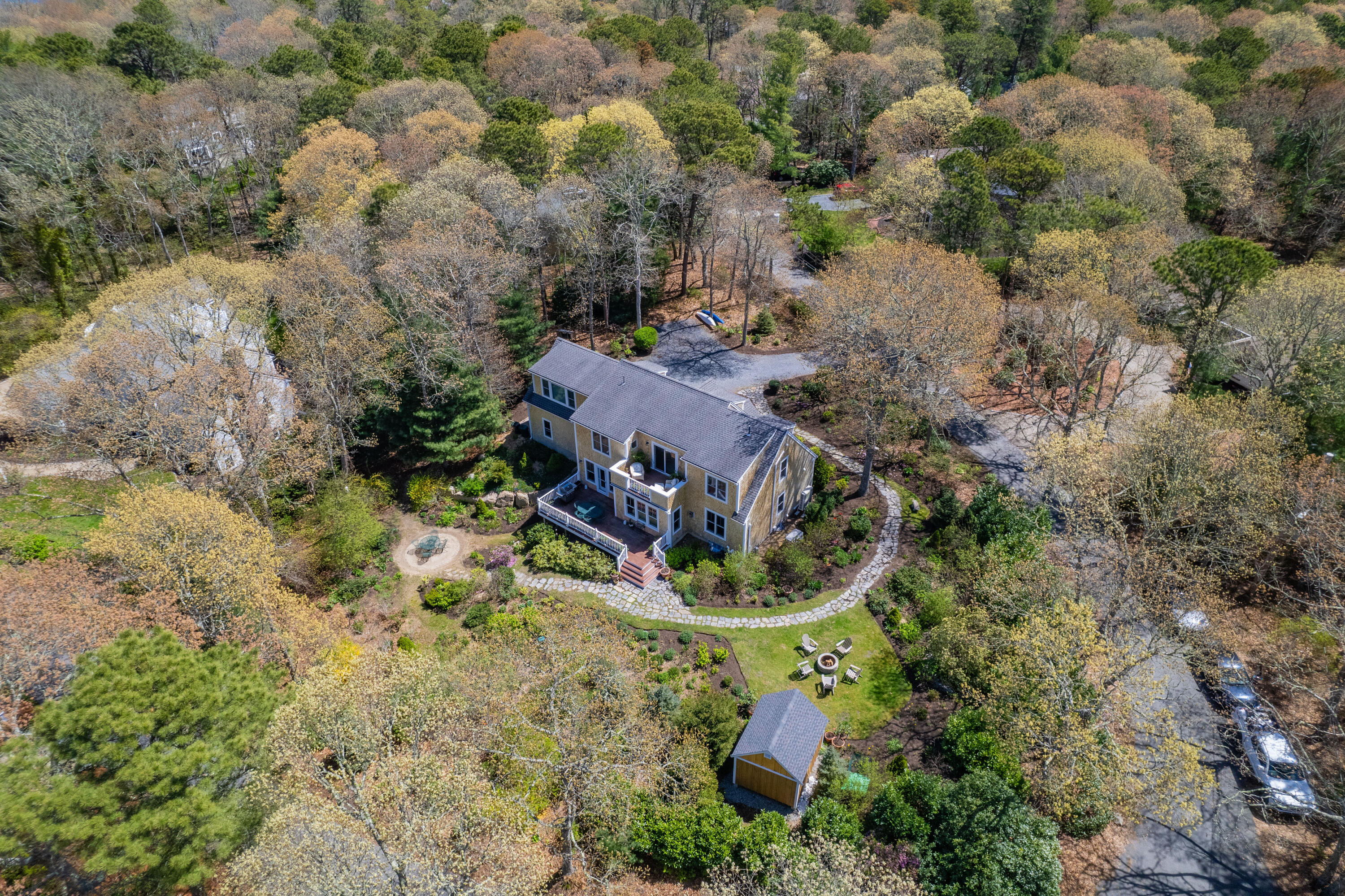 110 Clamshell Cove Road Cotuit, MA 02635 - Photo 48 of 56 an aerial view of a house with a yard