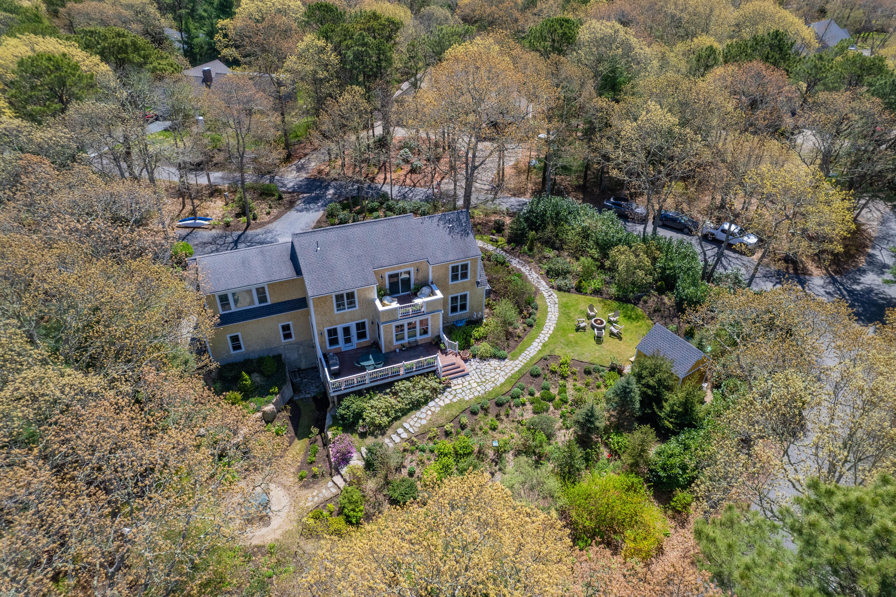 110 Clamshell Cove Road Cotuit, MA 02635 - Photo 49 of 56 an aerial view of a house with a garden