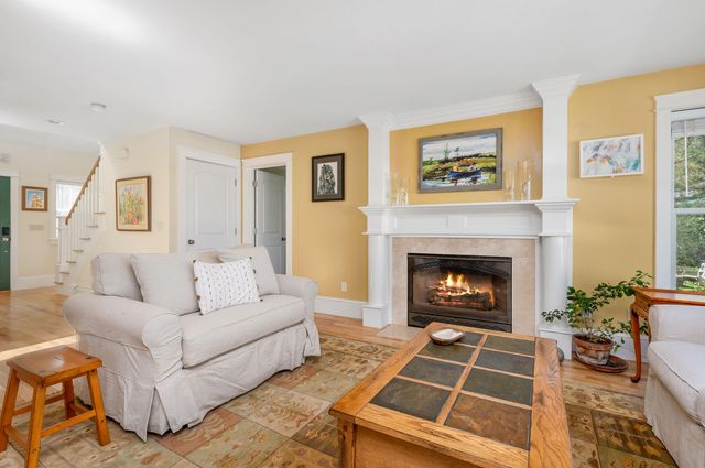 a bathroom with a sink a mirror and a toilet
