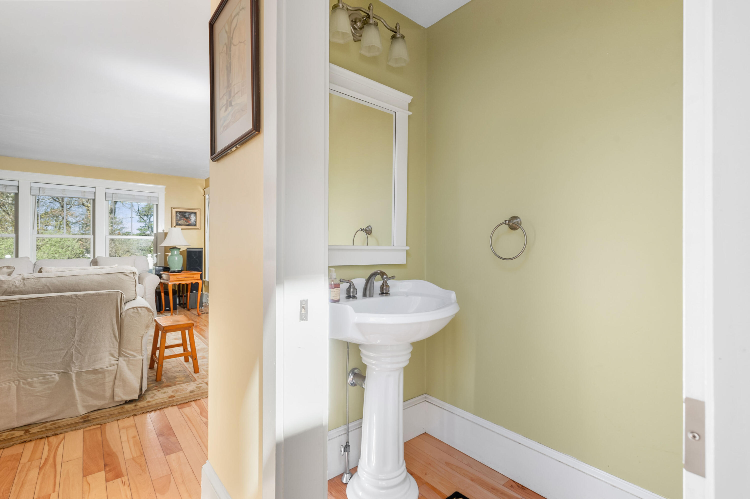 110 Clamshell Cove Road Cotuit, MA 02635 - Photo 10 of 56 a bathroom with a sink a mirror and a toilet