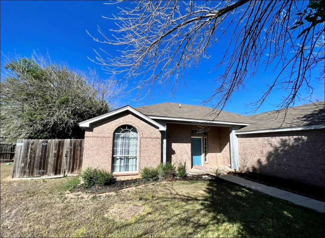 7108 Bluegrass Court Temple, TX 76502 - Photo 15 of 19 a front view of a house with garden