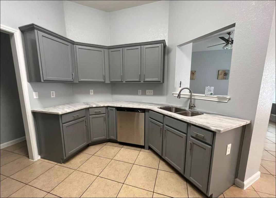 7108 Bluegrass Court Temple, TX 76502 - Photo 4 of 19 a kitchen with stainless steel appliances granite countertop a sink stove and cabinets