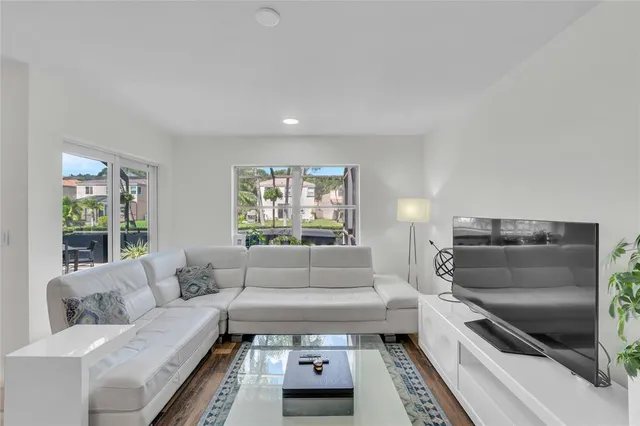 a living room with furniture and a couch