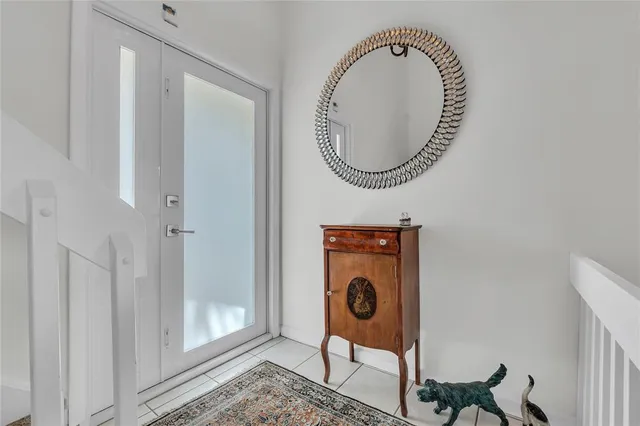 a bathroom with a sink a mirror and a toilet