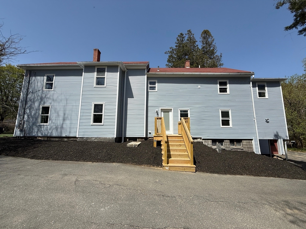 32 Main Street Monson, MA 01057 - Photo 3 of 42 front view of a house with a barbeque