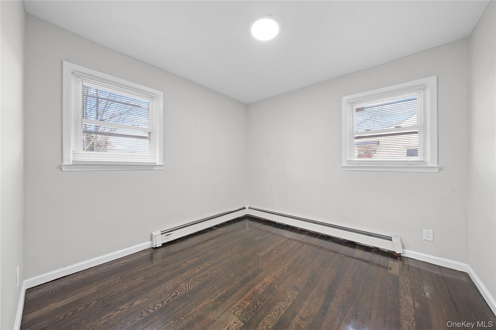 193 North Arizona Road West Babylon, NY 11704 - Photo 12 of 37 an empty room with a workbench