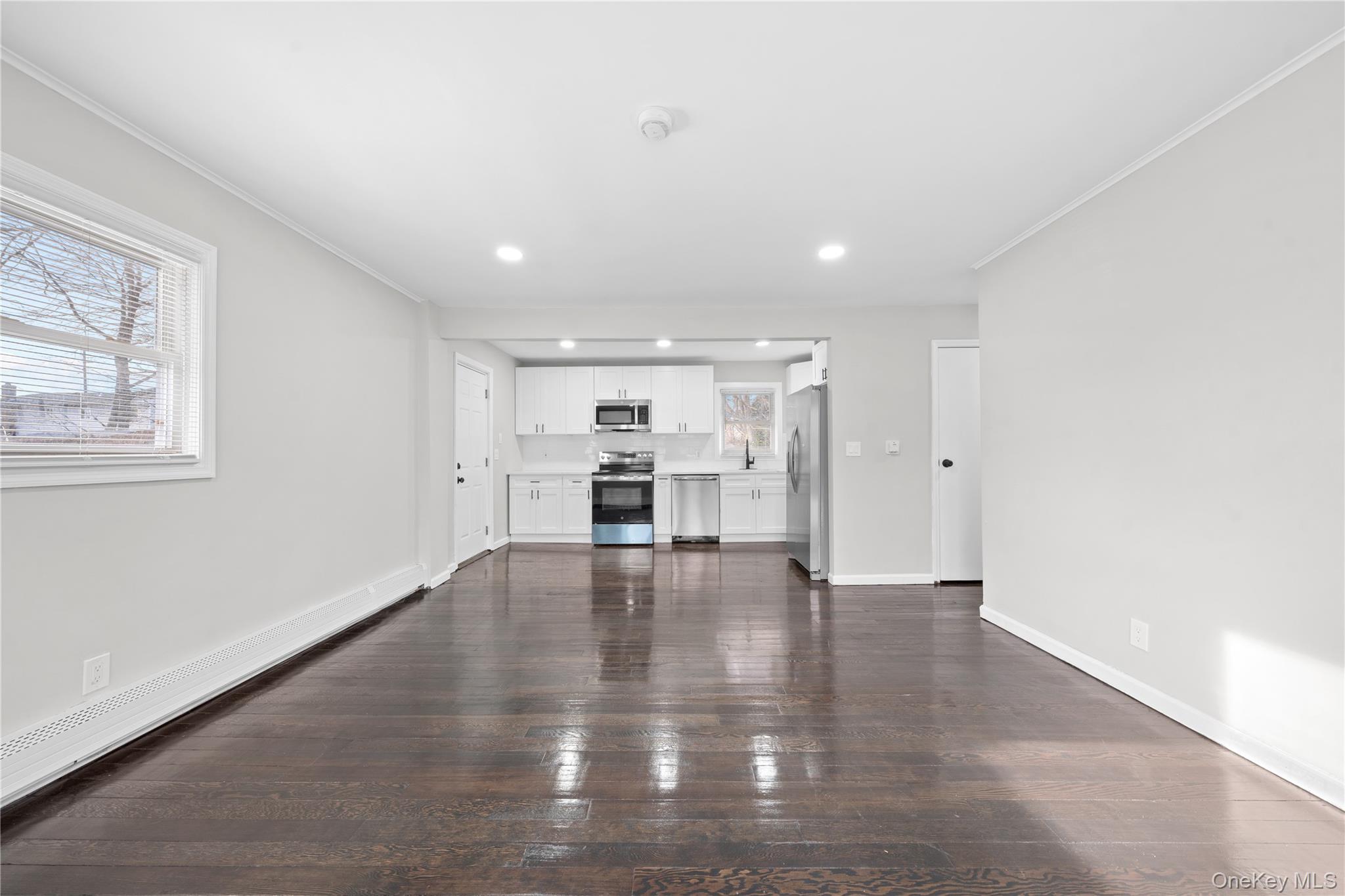 193 North Arizona Road West Babylon, NY 11704 - Photo 4 of 37 a view of empty room with wooden floor