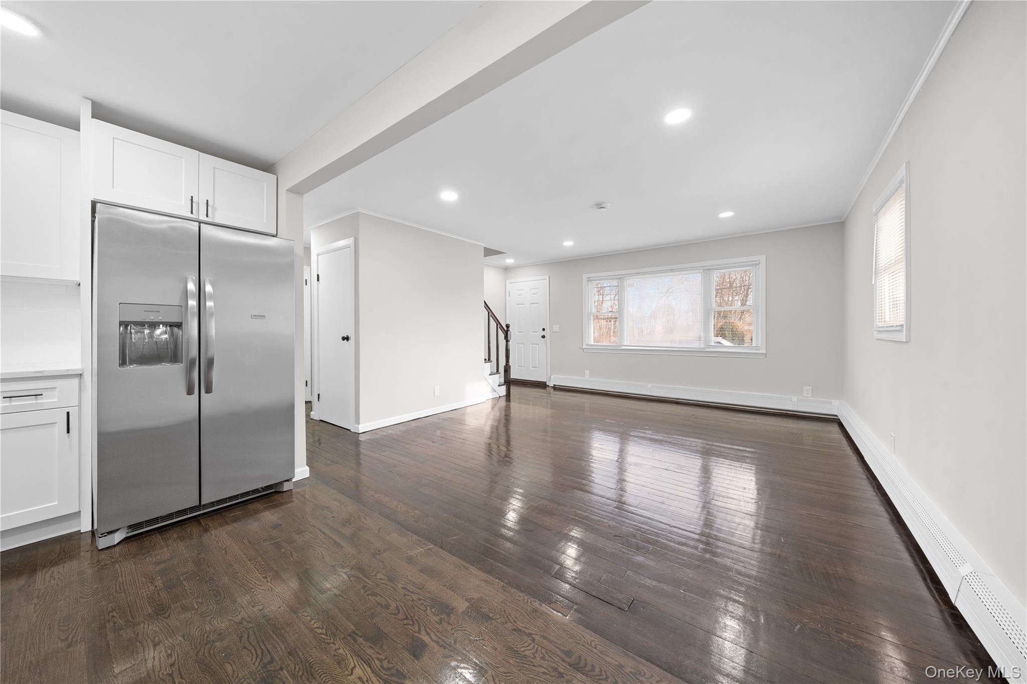193 North Arizona Road West Babylon, NY 11704 - Photo 6 of 37 a view of empty room with wooden floor and window