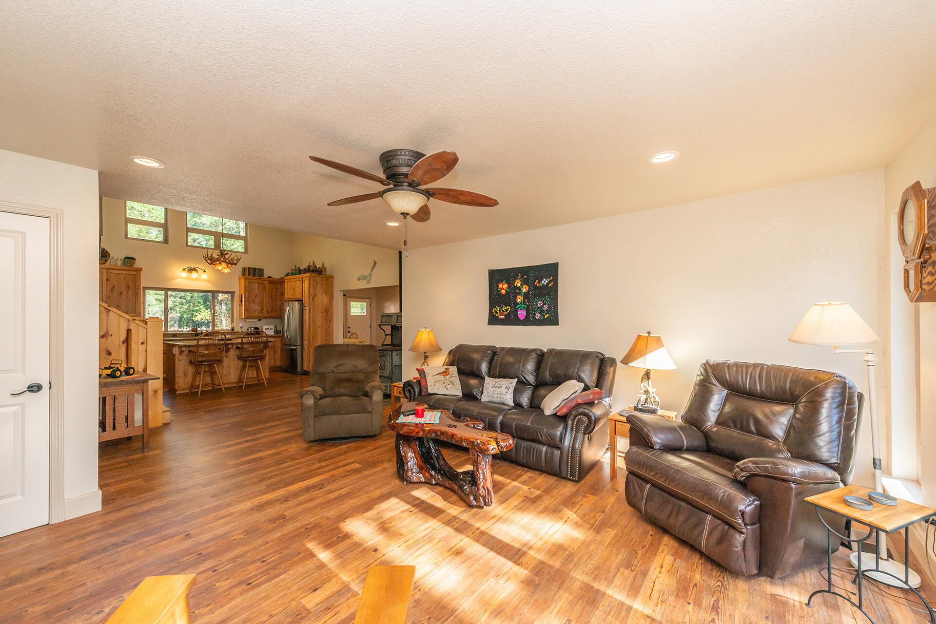 851 Mountain Aire Road Trinity Center, CA 96091 - Photo 9 of 54 a living room with furniture and a view of kitchen