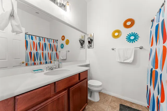 a bed room with a bed and a tv