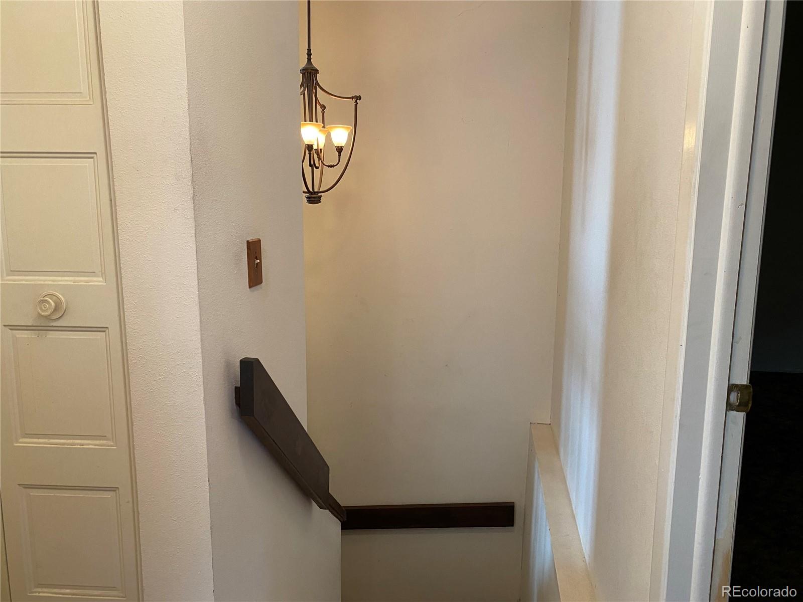 1165 Alter Way Broomfield, CO 80020 - Photo 17 of 31 a view of a hallway with windows