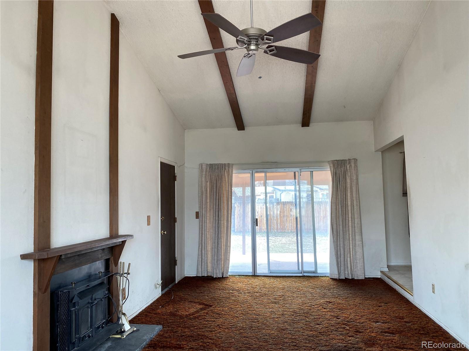 1165 Alter Way Broomfield, CO 80020 - Photo 2 of 31 a view of an empty room with windows