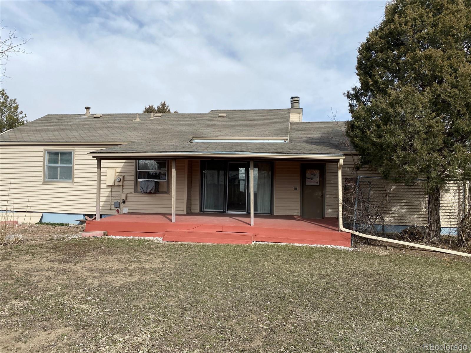 1165 Alter Way Broomfield, CO 80020 - Photo 29 of 31 a front view of a house with a yard