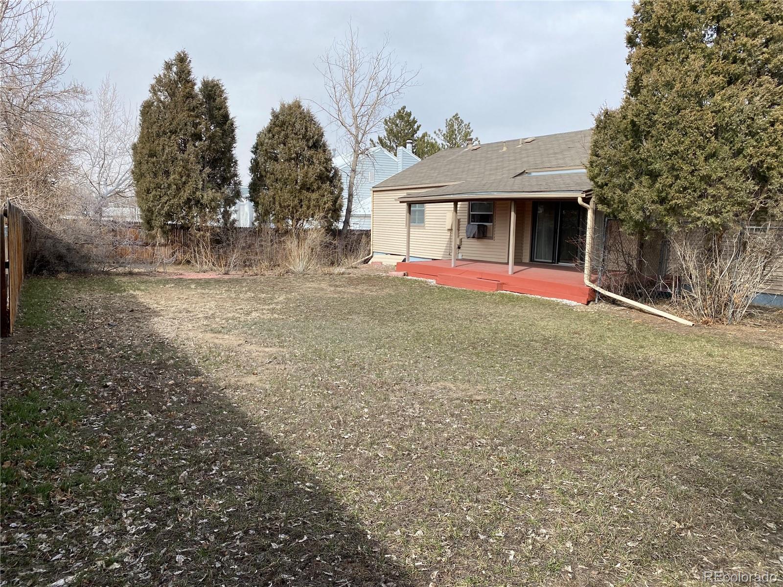 1165 Alter Way Broomfield, CO 80020 - Photo 30 of 31 a front view of a house with yard