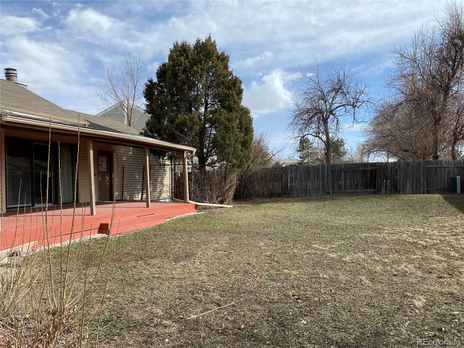 1165 Alter Way Broomfield, CO 80020 - Photo 31 of 31 front view of a house with a yard