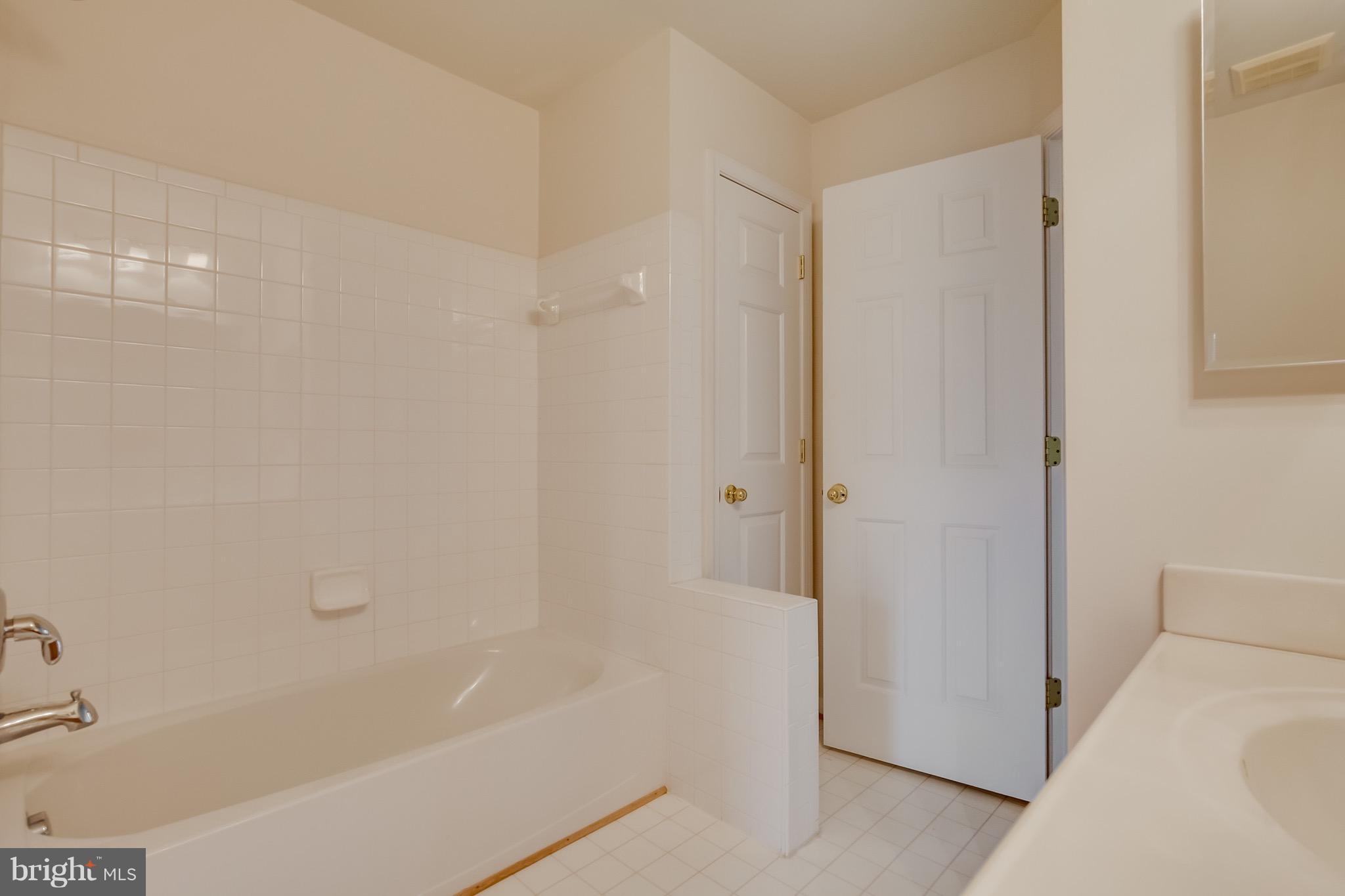 607 Tivoli Road Frederick, MD 21703 - Photo 18 of 30 Double vanity. tub, and separate shower.
