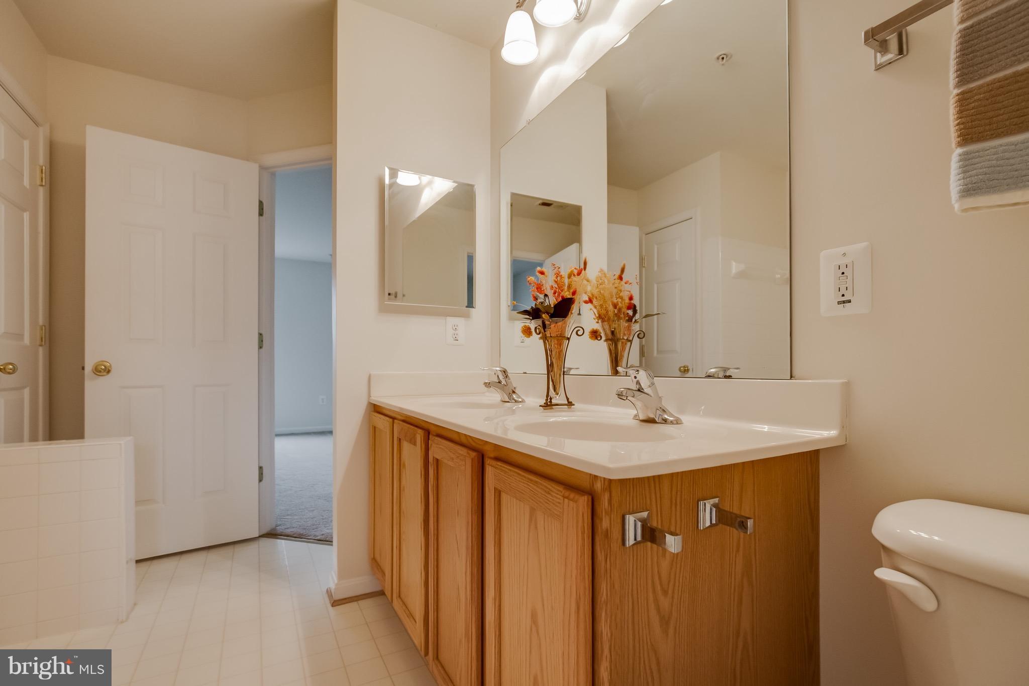607 Tivoli Road Frederick, MD 21703 - Photo 19 of 30 Double vanity, tub, separate shower.