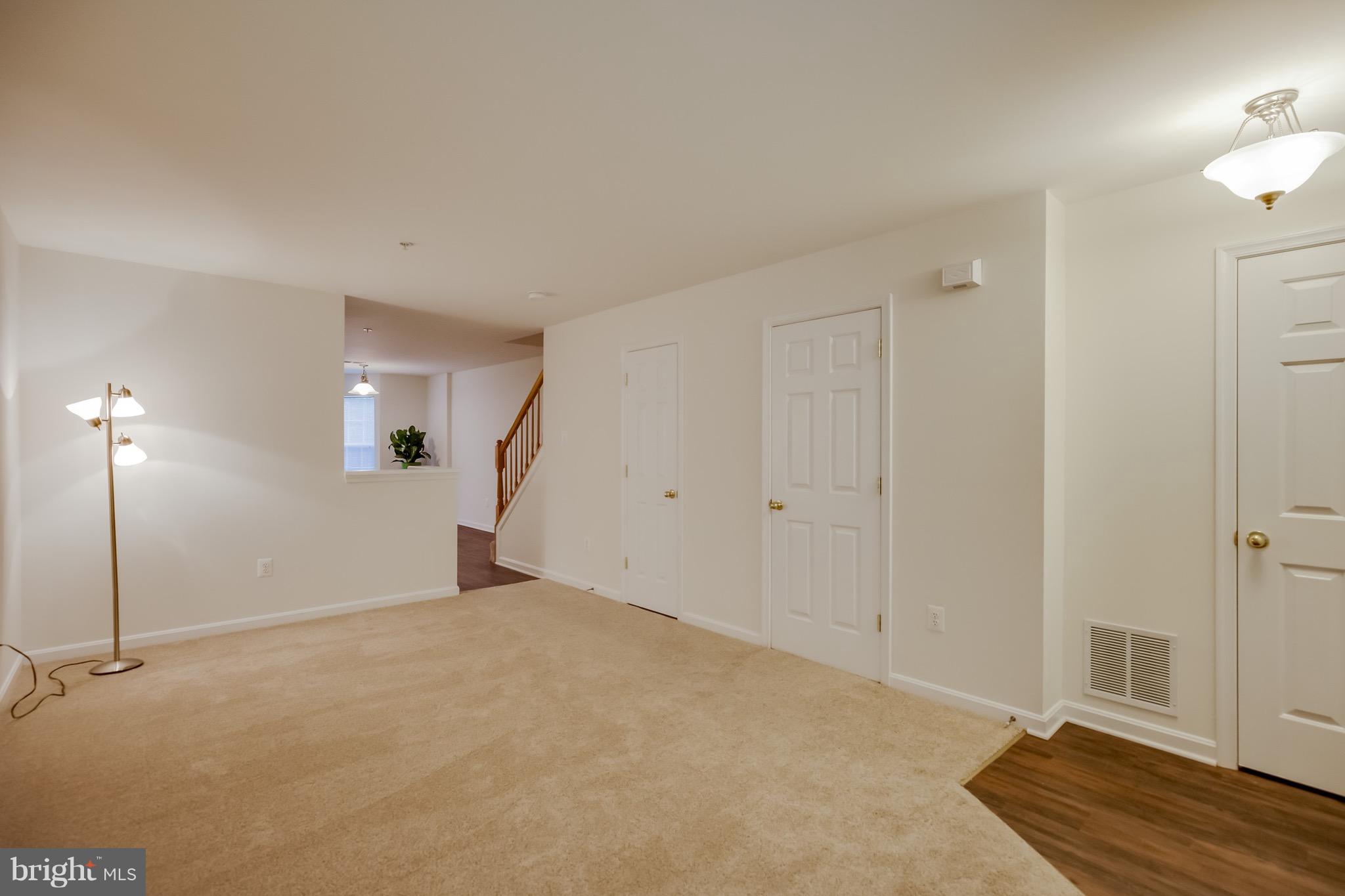 607 Tivoli Road Frederick, MD 21703 - Photo 6 of 30 From front entrance PLUS HALF BATH (door closed)