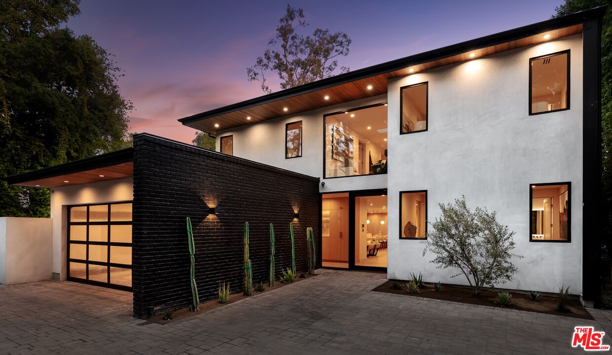 4724 Noeline Avenue Encino, CA 91436 - Photo 1 of 44 a front view of a house