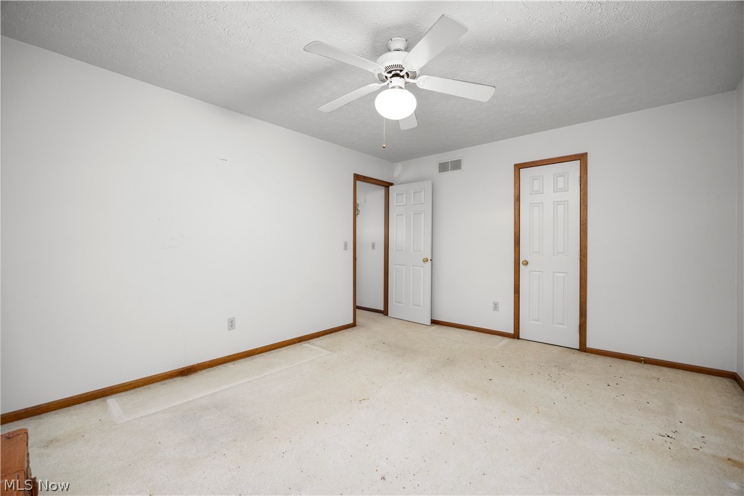 722 Jaycox Road Avon Lake, OH 44012 - Photo 35 of 48 Neutral-toned room with white walls and baseboard trim