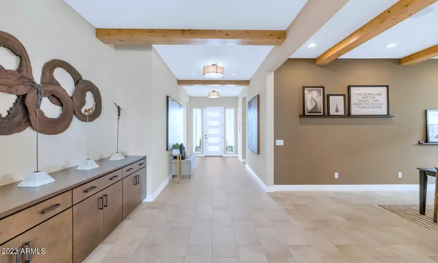 a spacious bathroom with a double vanity sink and a mirror