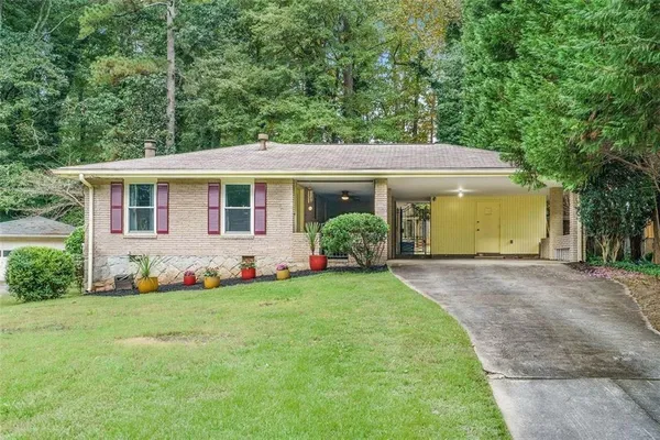 front view of a house with a yard