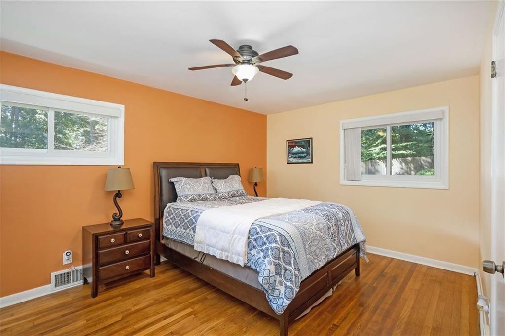 1220 Blueberry Trail Decatur, GA 30033 - Photo 24 of 30 a bedroom with a bed and a window