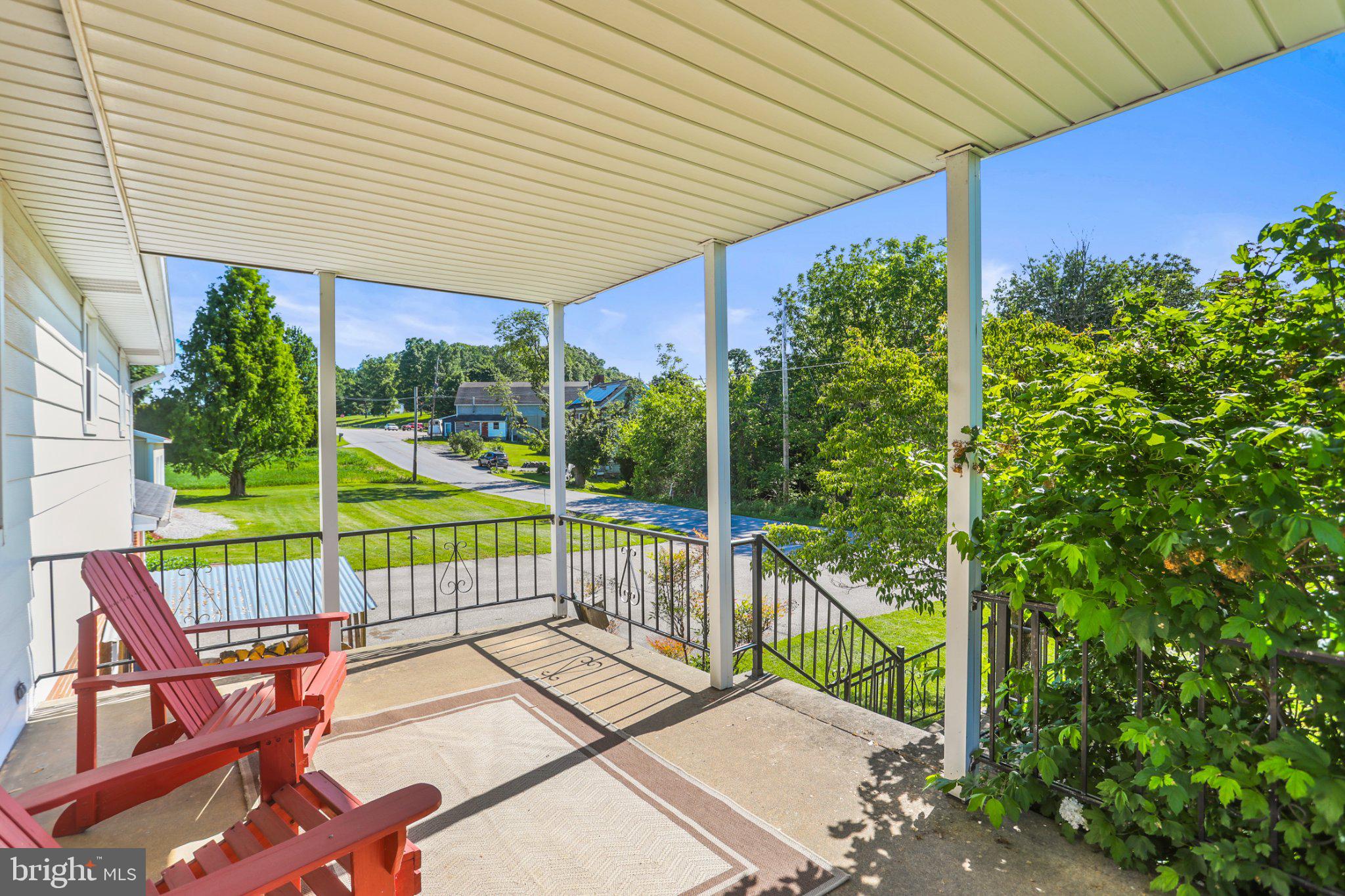 1734 Cemetery Road York, PA 17408 - Photo 52 of 52 Charming porch with scenic views.