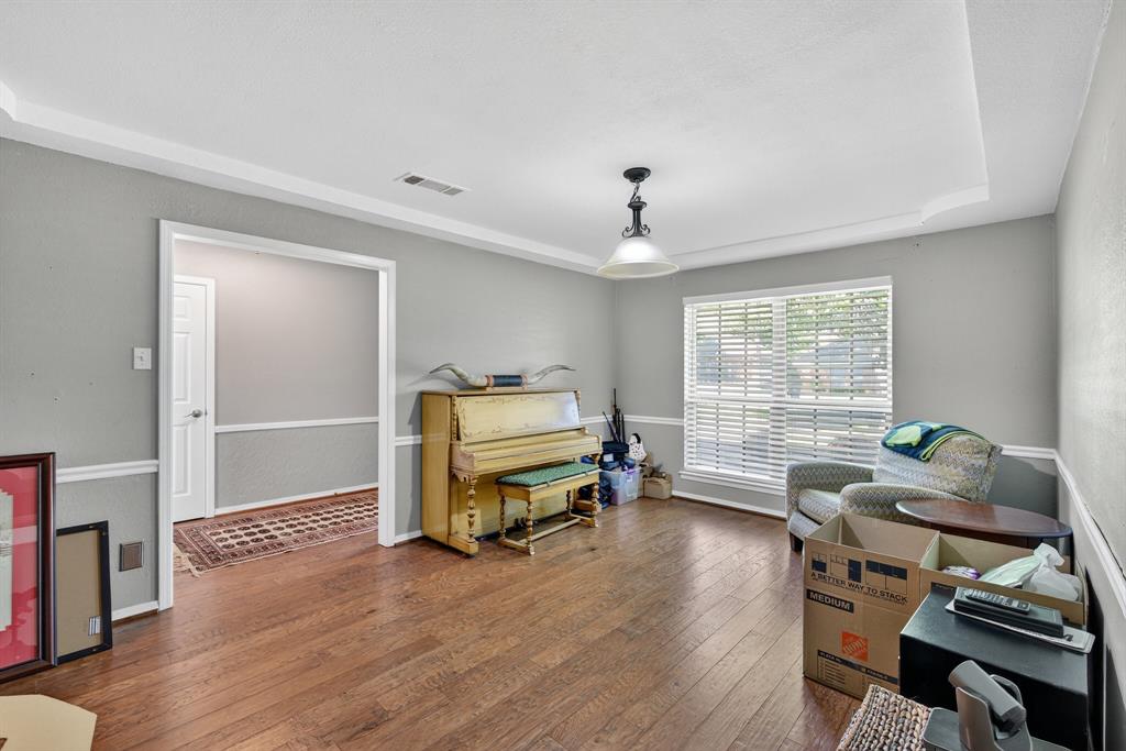 1128 Sunset Drive Trophy Club, TX 76262 - Photo 22 of 30 a living room with furniture and a window