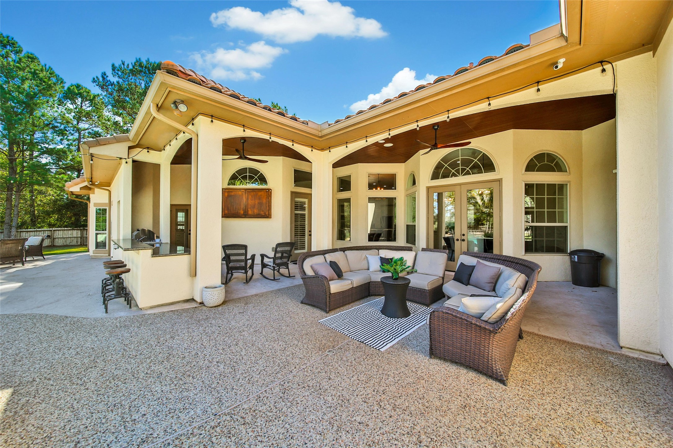 26122 Crown Ranch Boulevard Montgomery, TX 77316 - Photo 26 of 31 a view of a building with couches and a table