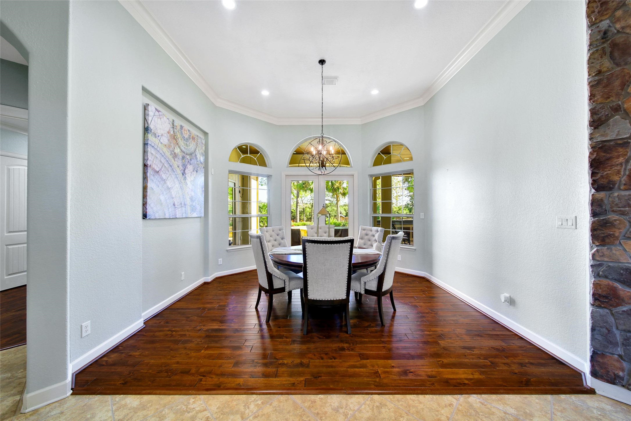 26122 Crown Ranch Boulevard Montgomery, TX 77316 - Photo 6 of 31 a view of a dining room with furniture window and wooden floor