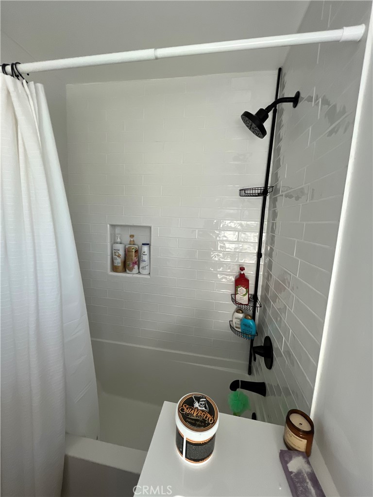 12042 Hackamore Road Garden Grove, CA 92840 - Photo 13 of 20 a bathroom with a sink and toilet