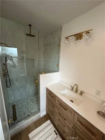 a bathroom with a sink and mirror