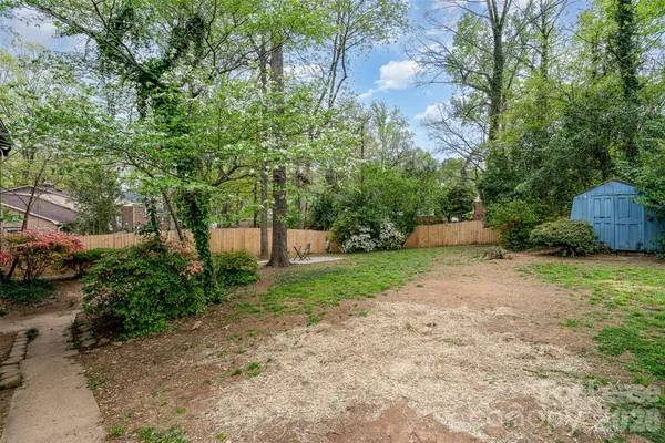 a view of backyard with green space