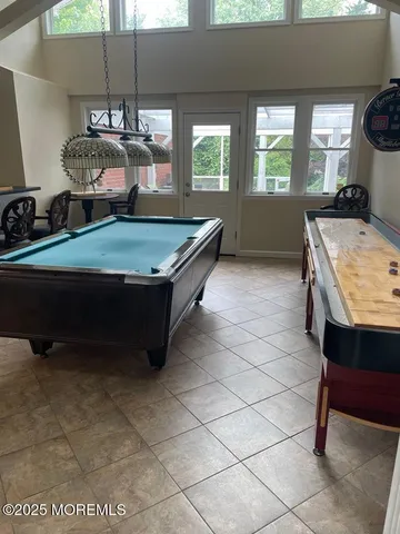 a room with gym equipment and window