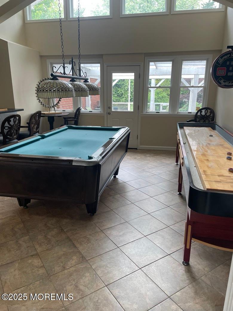 470 Monmouth Place Long Branch, NJ 07740 - Photo 11 of 25 a room with gym equipment and window