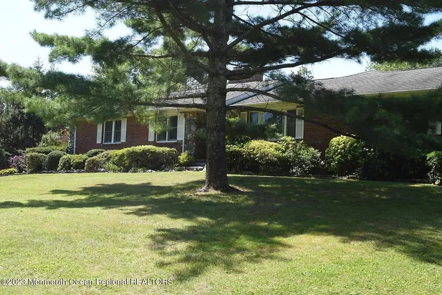 a house view with a garden space