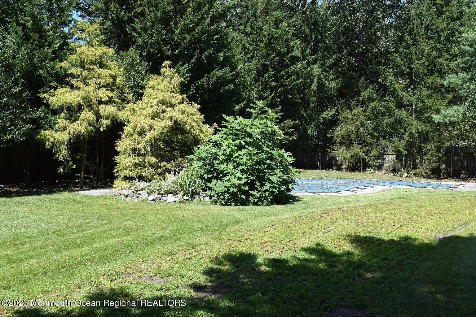 470 Monmouth Place Long Branch, NJ 07740 - Photo 24 of 25 a view of yard with swimming pool and green space