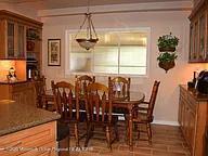 470 Monmouth Place Long Branch, NJ 07740 - Photo 5 of 25 a view of a dining room with furniture and window